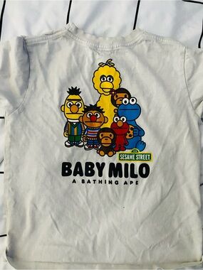 Bape Baby Milo Sesame Street Graphic Tee - White with Yellow, Blue, Red, Black